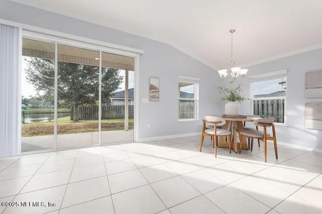 a view of a livingroom with furniture window and outside view