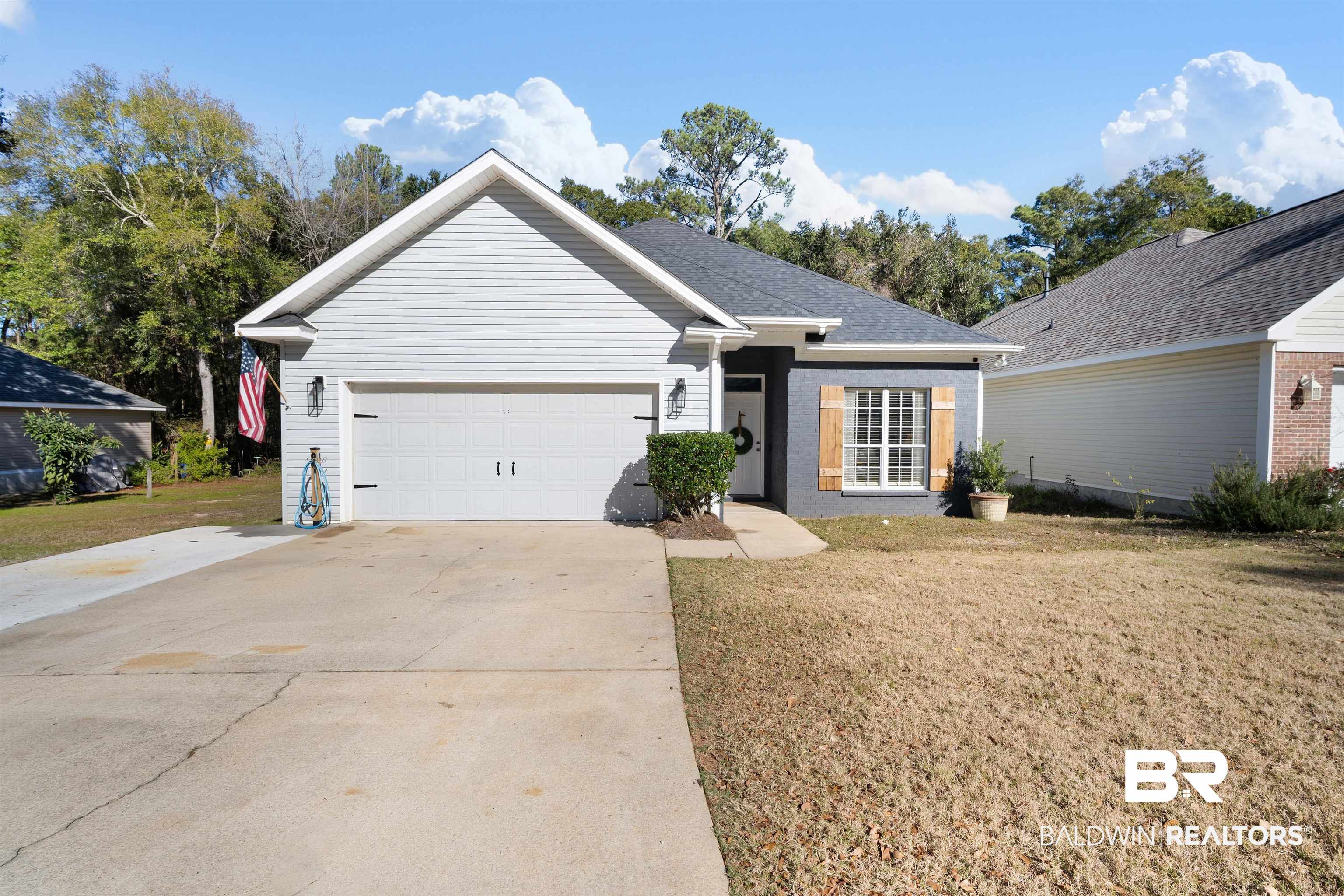27288 Parker Lane Daphne, AL 36526 - Photo 26 of 29 Single story home featuring a front lawn, driveway, and an attached garage