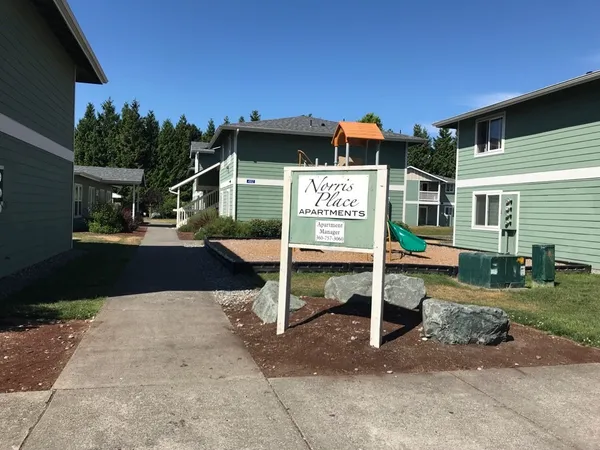 a sign that is on the side of a road