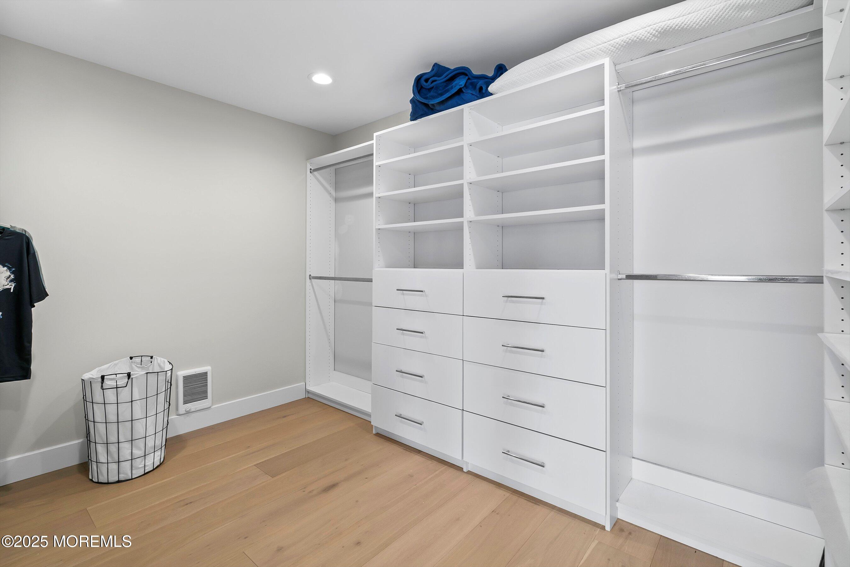 72 4th Street Highlands, NJ 07732 - Photo 16 of 43 a view of wooden floor with cabinets
