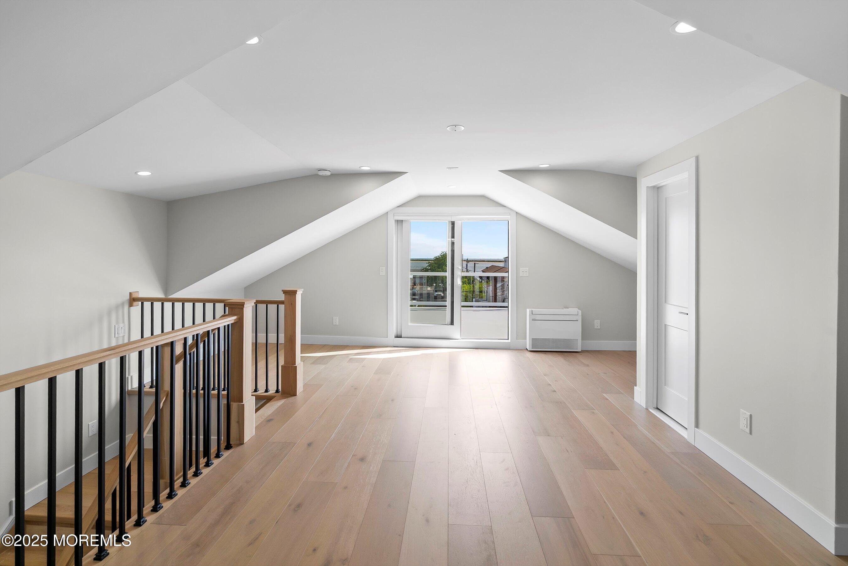 72 4th Street Highlands, NJ 07732 - Photo 27 of 43 wooden floor in an empty room with a window