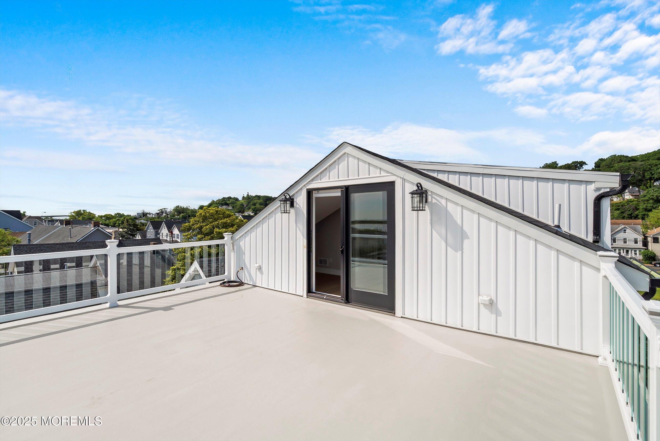 72 4th Street Highlands, NJ 07732 - Photo 30 of 43 a view of a house with balcony