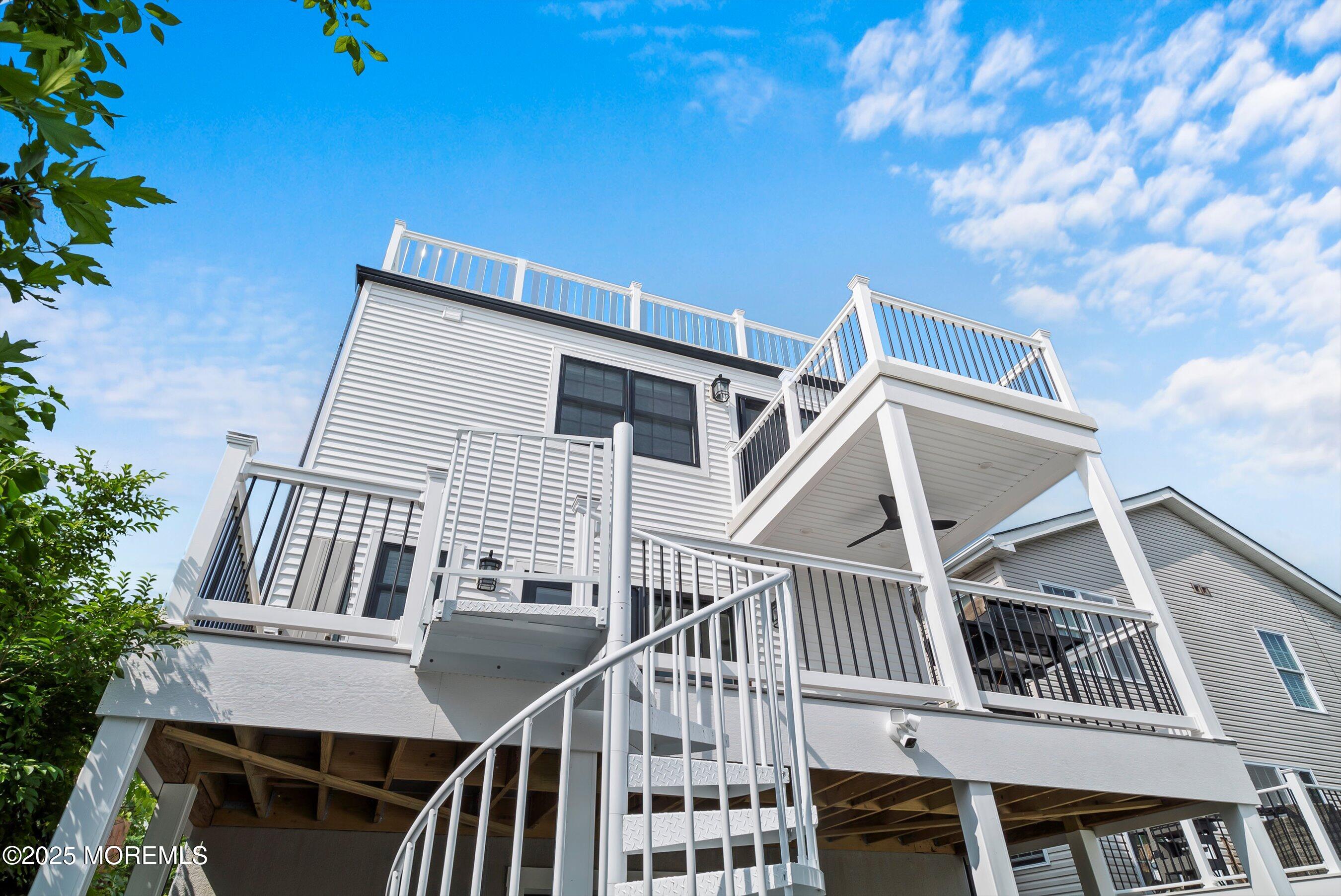 72 4th Street Highlands, NJ 07732 - Photo 34 of 43 a view of a house with a deck