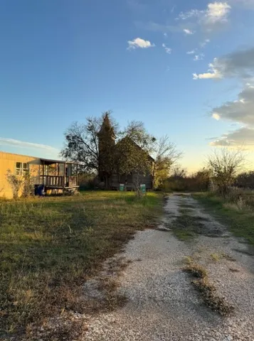 a view of an outdoor space and a yard