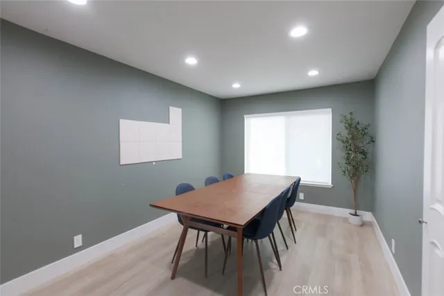 a workspace with furniture and window