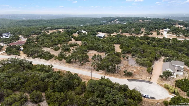 an aerial view of city and lake view