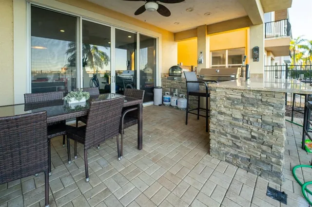 a outdoor space with lots of tables and chairs