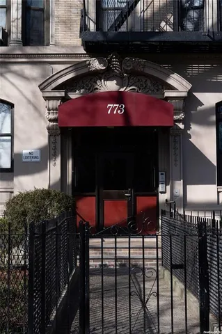 a view of a building and a street