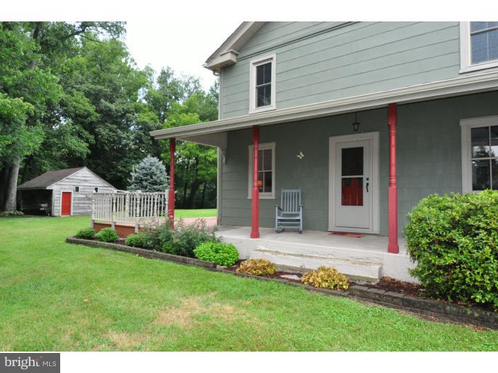 155 Sharp Road Avondale, PA 19311 - Photo 2 of 25 a view of a house with a yard and plants