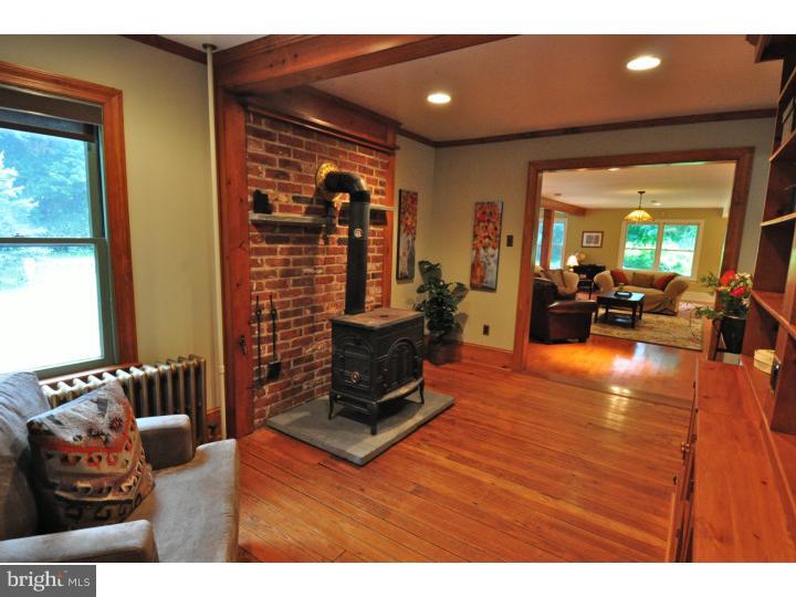 155 Sharp Road Avondale, PA 19311 - Photo 14 of 25 a living room with furniture and a large window