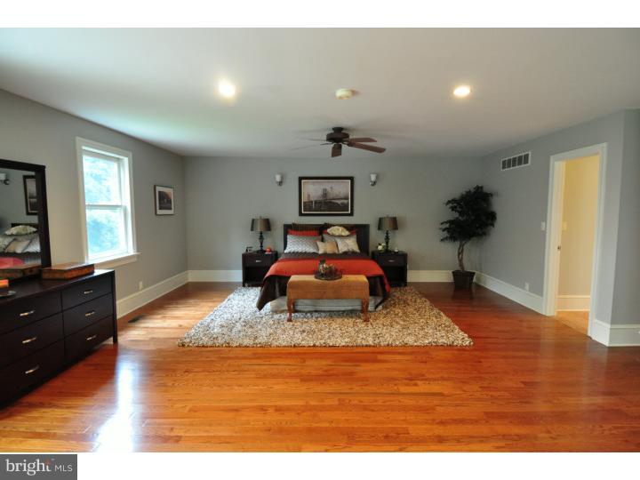 155 Sharp Road Avondale, PA 19311 - Photo 17 of 25 a bedroom with a bed and a dresser