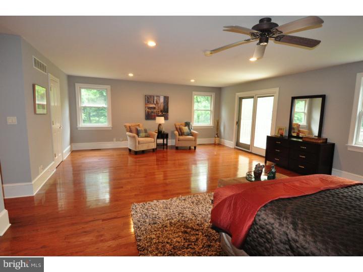 155 Sharp Road Avondale, PA 19311 - Photo 18 of 25 a living room with furniture window and wooden floor