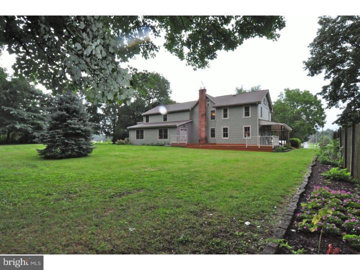 155 Sharp Road Avondale, PA 19311 - Photo 5 of 25 a view of a house with a big yard with large tree