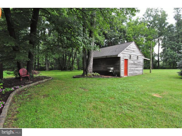 155 Sharp Road Avondale, PA 19311 - Photo 6 of 25 a front view of a house with garden