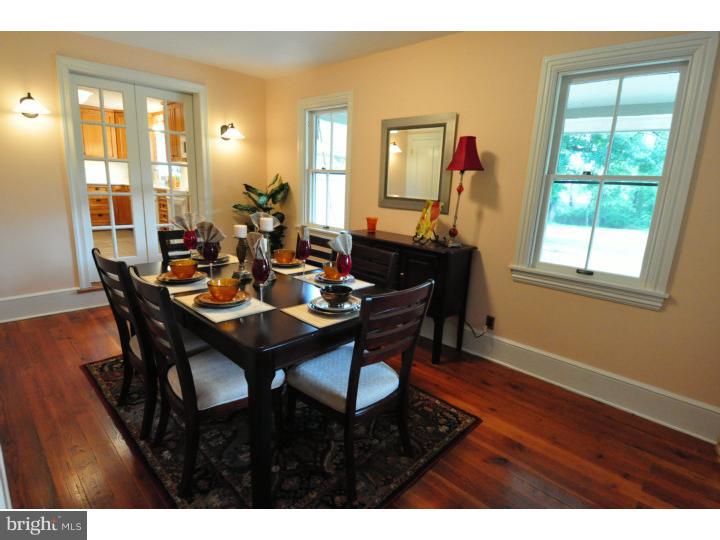 155 Sharp Road Avondale, PA 19311 - Photo 9 of 25 a view of a dining room with furniture and wooden floor