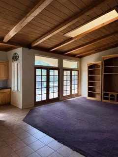 a view of a livingroom with furniture and a fireplace