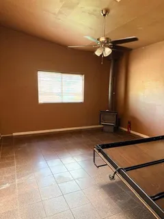 a bathroom with a toilet and a bath tub