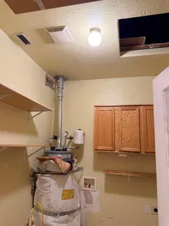 a room with a bed and a window