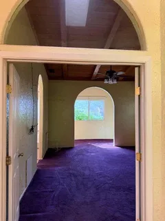 a bathroom with a tub and a shower