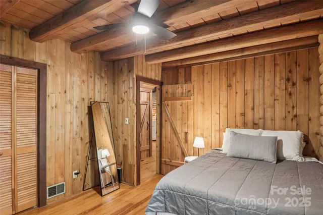 a view of a balcony with wooden floor