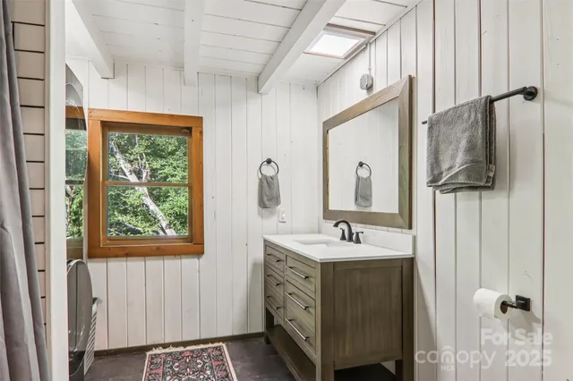 a big yard with lots of green space and trees