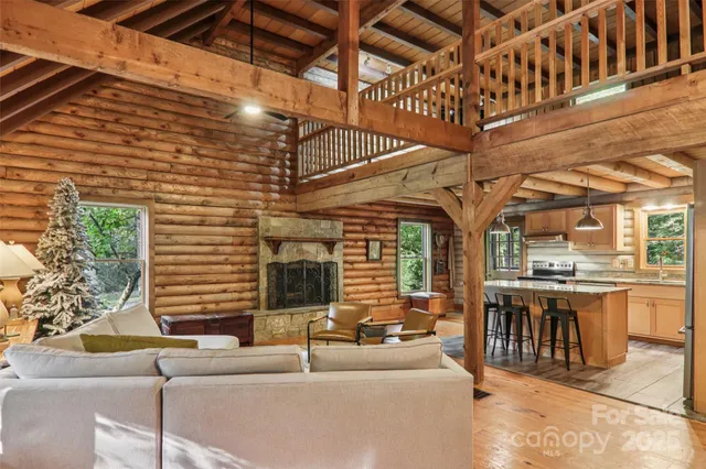 a kitchen with stainless steel appliances granite countertop a stove a refrigerator and a sink