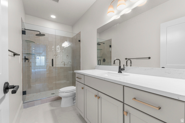 11718 South Halls Crk Road Draper, UT 84020 - Photo 23 of 28 Bathroom with vanity and a stall shower