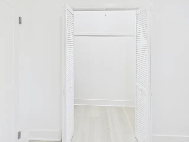 a close up of a white marble wall