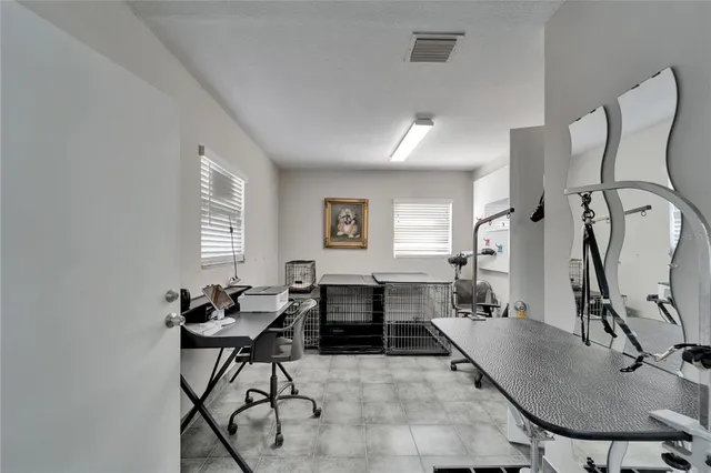 a bathroom with a sink a toilet and shower curtain