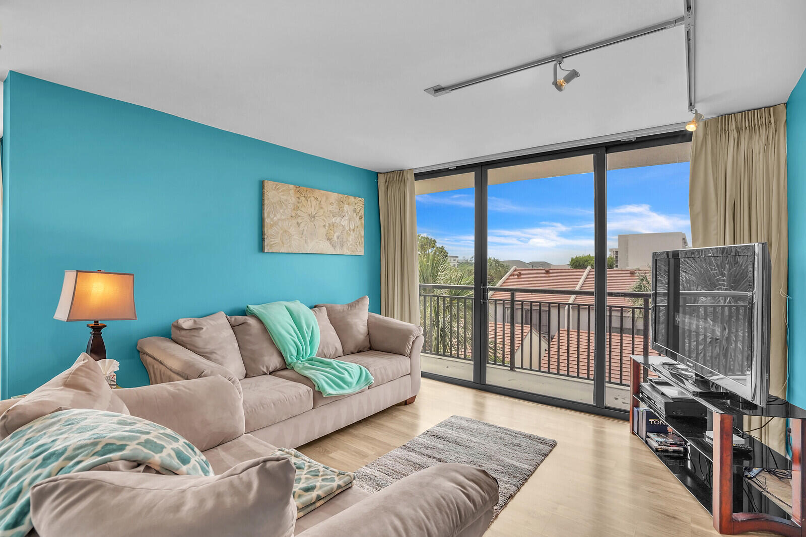 2667 North Ocean Boulevard, Unit I312 Boca Raton, FL 33431 - Photo 13 of 77 a living room with furniture and a floor to ceiling window