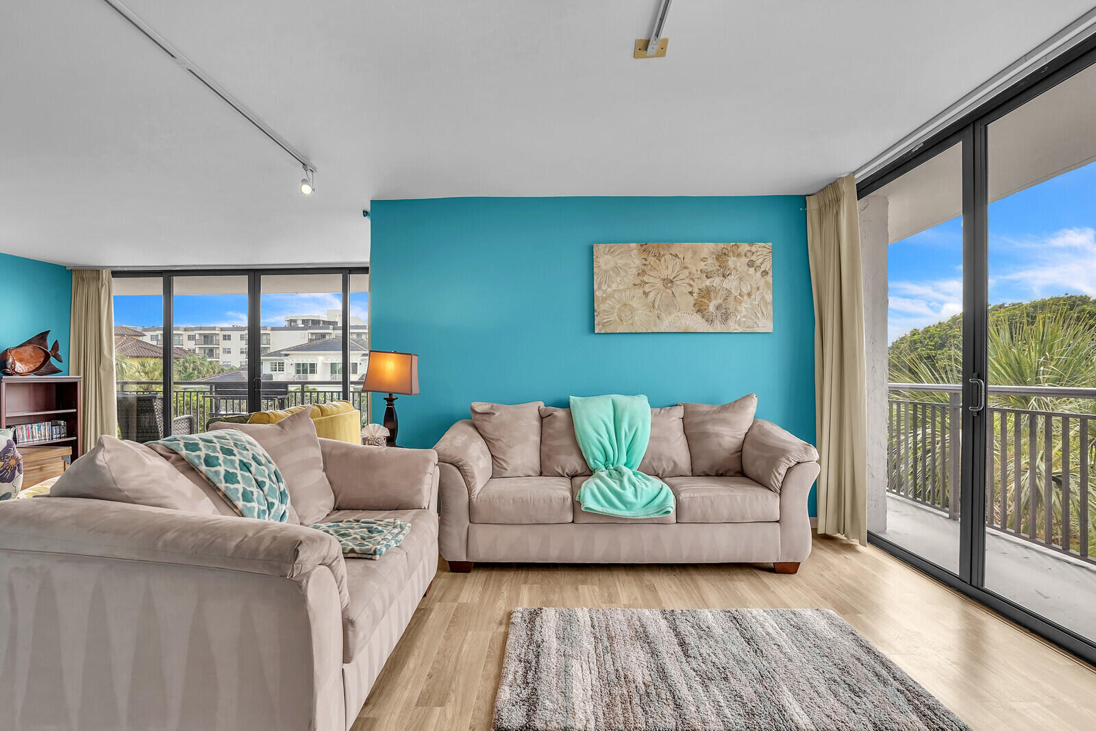 2667 North Ocean Boulevard, Unit I312 Boca Raton, FL 33431 - Photo 14 of 77 a living room with furniture and a large window