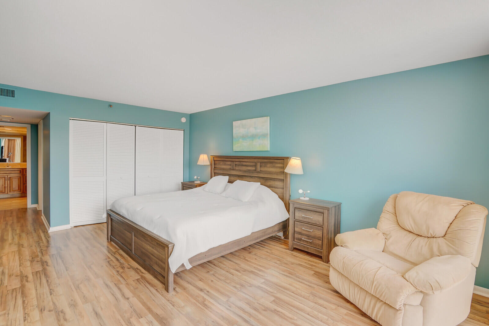 2667 North Ocean Boulevard, Unit I312 Boca Raton, FL 33431 - Photo 23 of 77 a bedroom with a bed and a couch