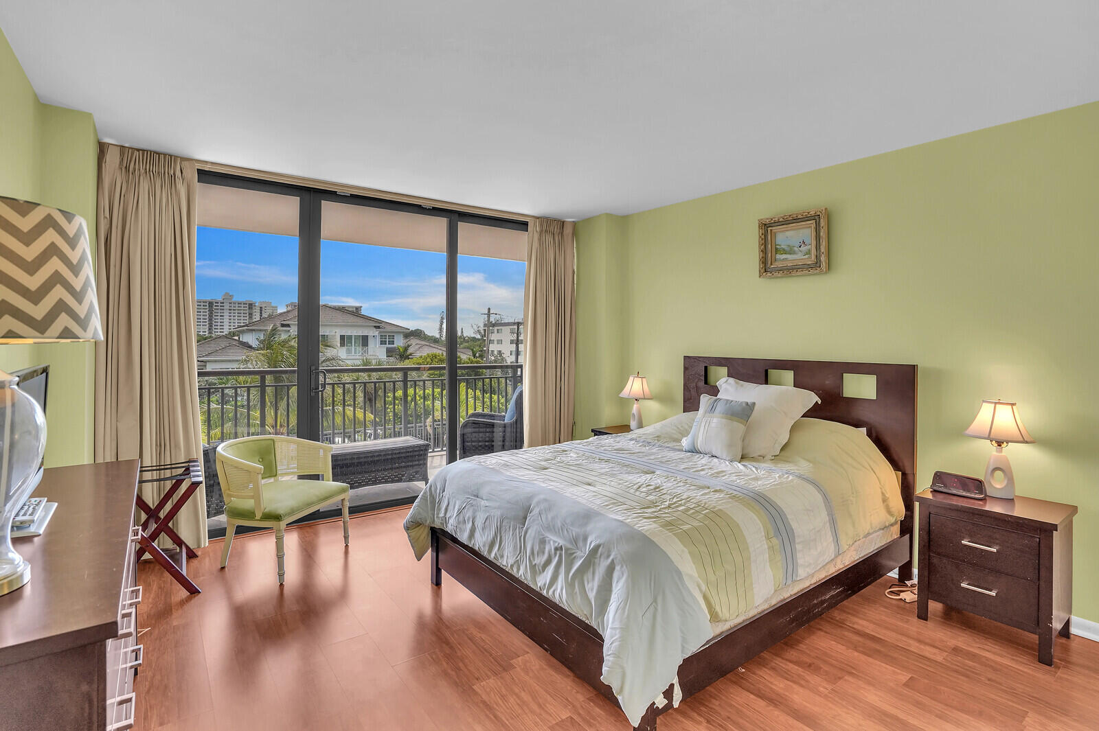 2667 North Ocean Boulevard, Unit I312 Boca Raton, FL 33431 - Photo 25 of 77 a bedroom with a bed and a large window