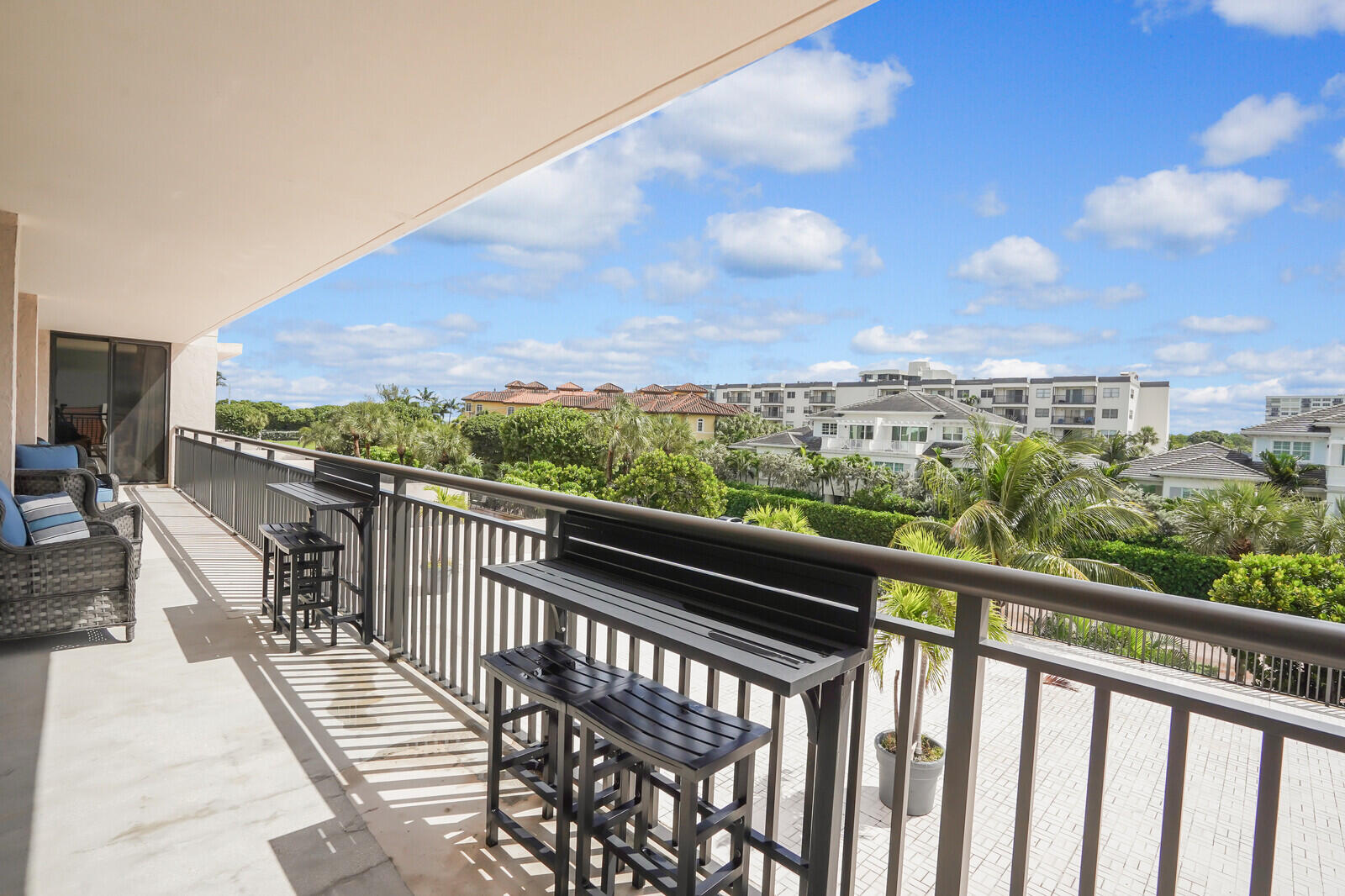 2667 North Ocean Boulevard, Unit I312 Boca Raton, FL 33431 - Photo 37 of 77 a view of balcony with wooden floor and city view