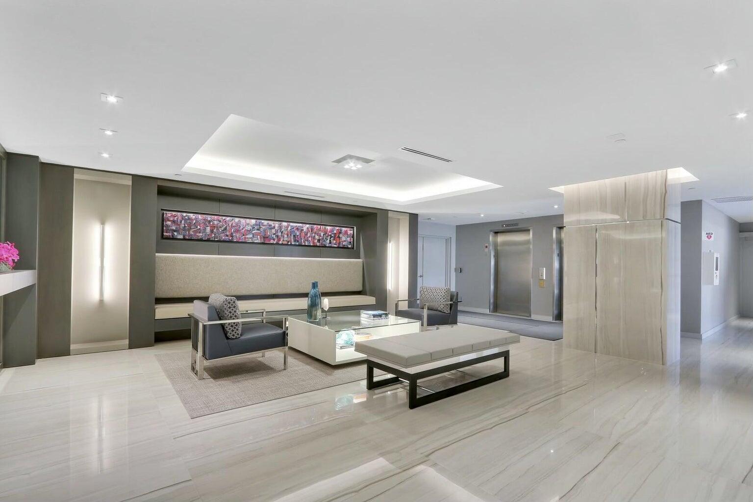 2667 North Ocean Boulevard, Unit I312 Boca Raton, FL 33431 - Photo 5 of 77 a living room with furniture and a potted plant