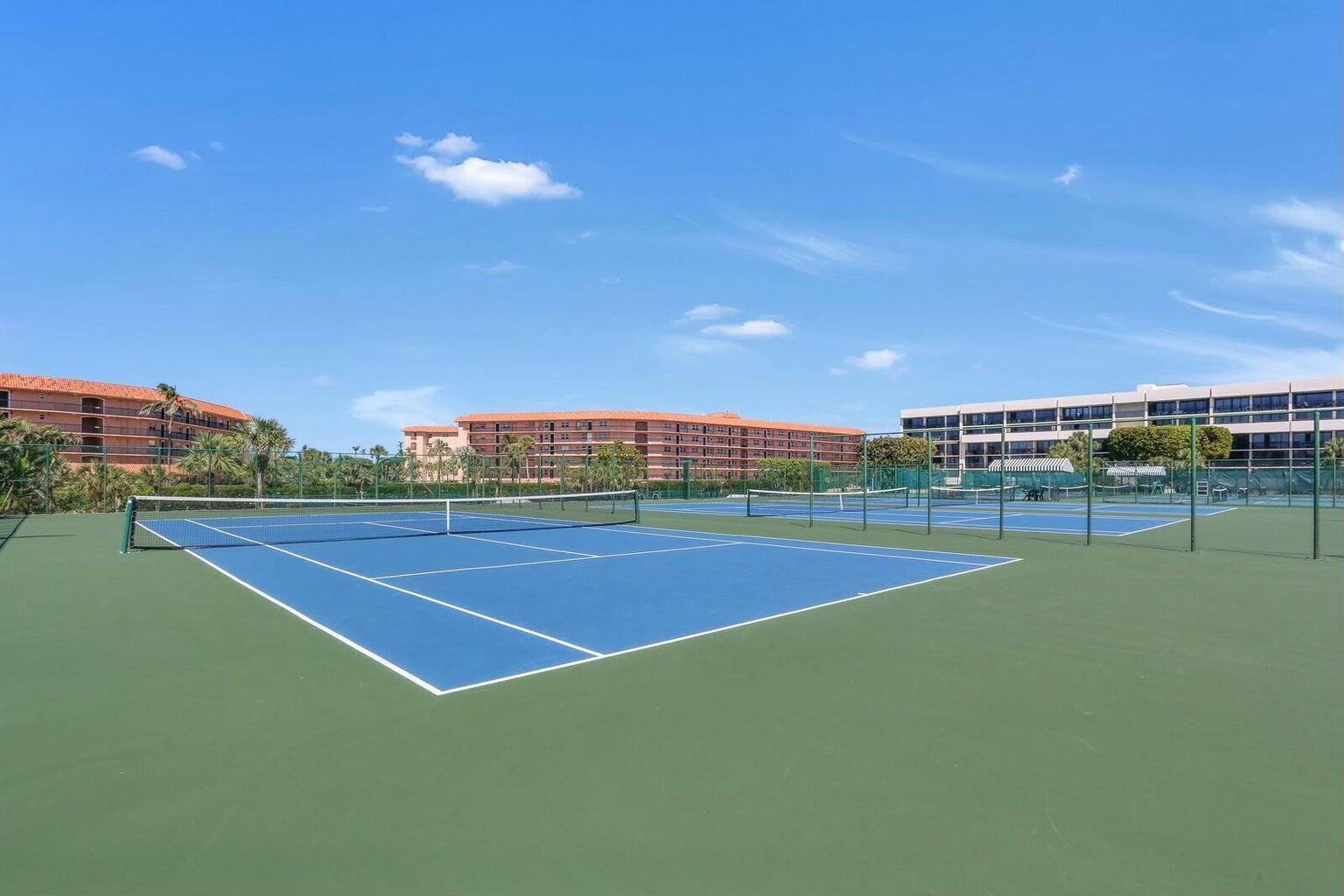 2667 North Ocean Boulevard, Unit I312 Boca Raton, FL 33431 - Photo 57 of 77 a view of an outdoor space and tennis court