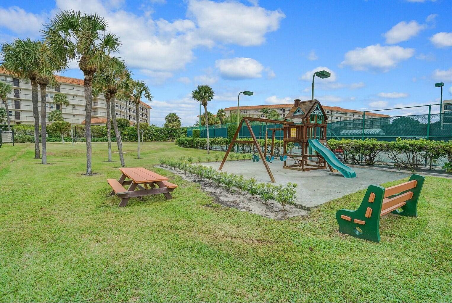 2667 North Ocean Boulevard, Unit I312 Boca Raton, FL 33431 - Photo 62 of 77 a view of outdoor space with playground and green space