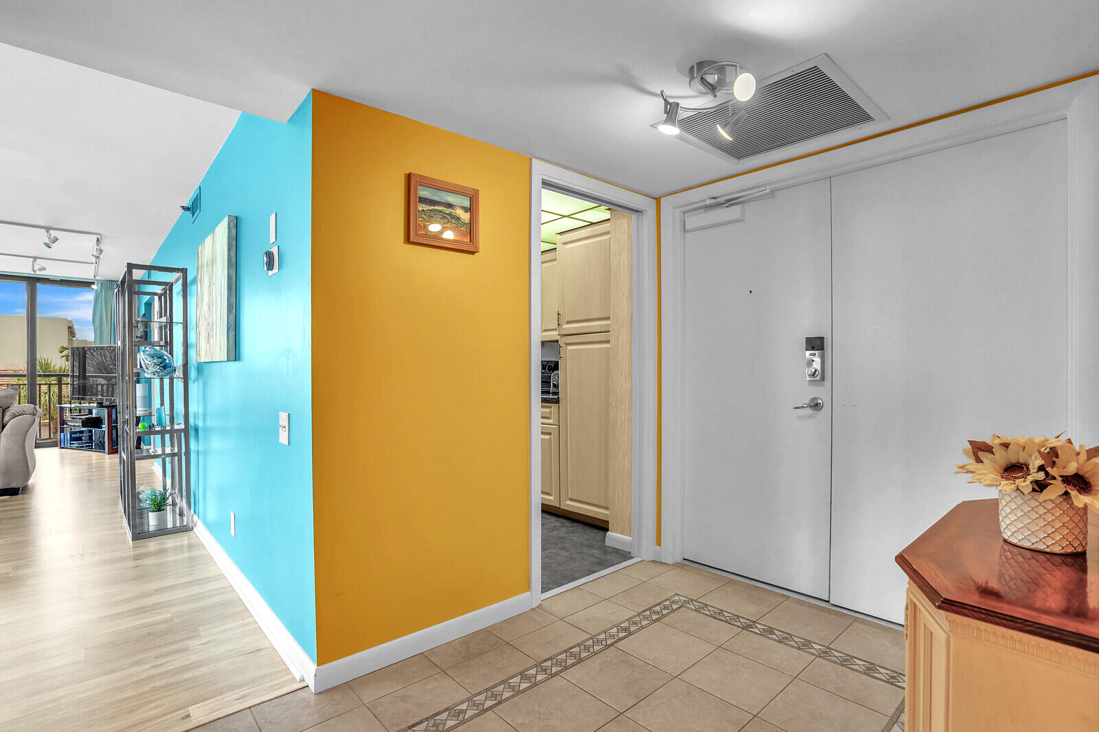 2667 North Ocean Boulevard, Unit I312 Boca Raton, FL 33431 - Photo 8 of 77 a view of a hallway with wooden floor and staircase