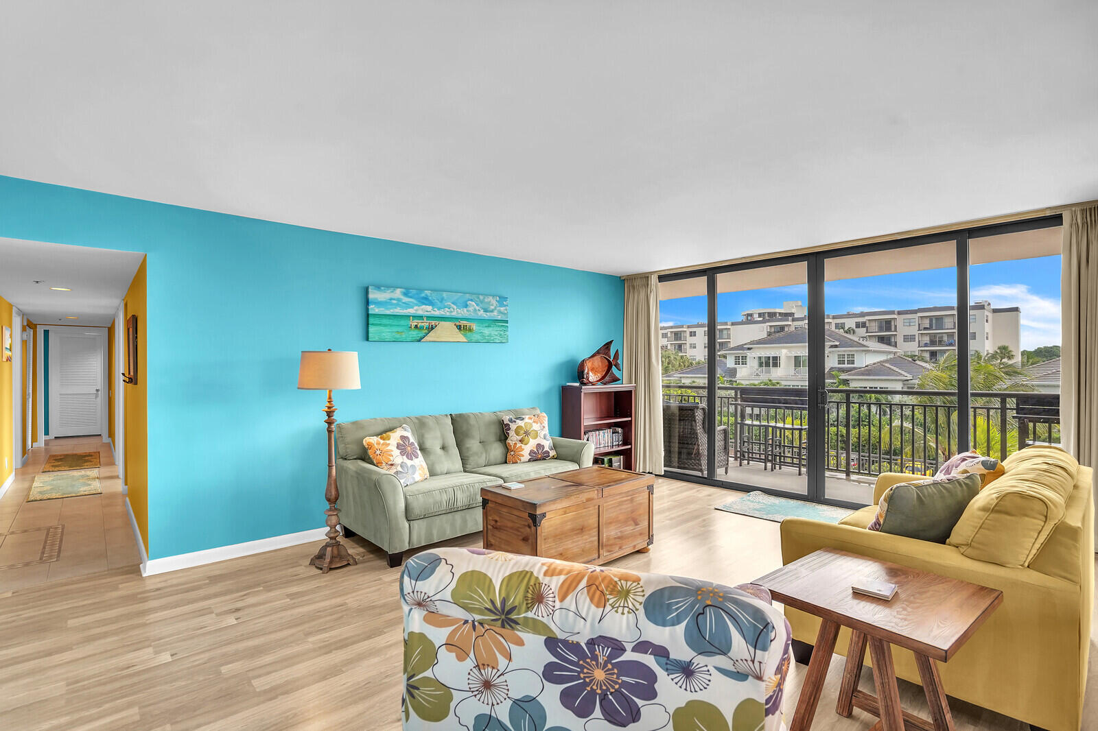 2667 North Ocean Boulevard, Unit I312 Boca Raton, FL 33431 - Photo 10 of 77 a living room with furniture and a floor to ceiling window