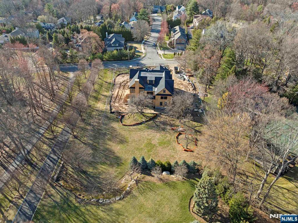 379 Anderson Avenue Alpine, NJ 07620 - Photo 10 of 15 a view of a lake with a house