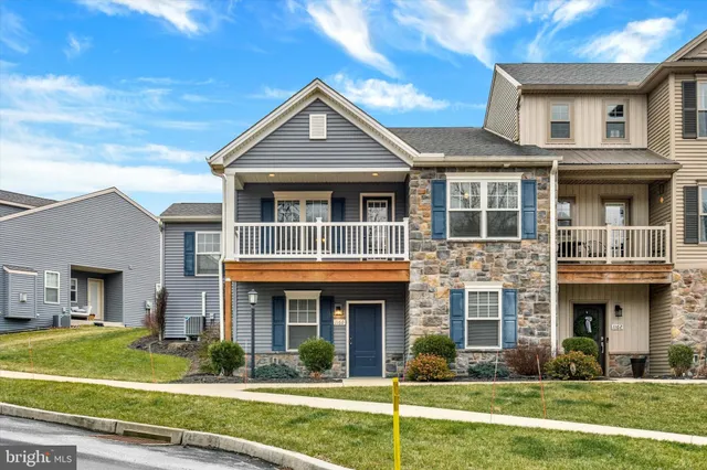 a front view of a brick house