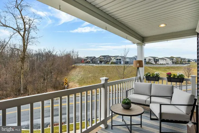 a view of a chairs in the balcony