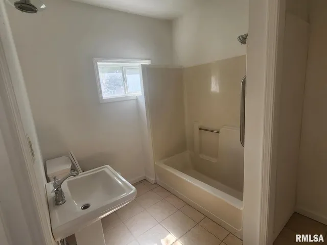 a bathroom with a tub