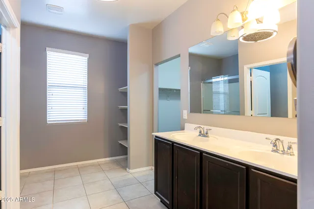 a bathroom with a shower and a toilet