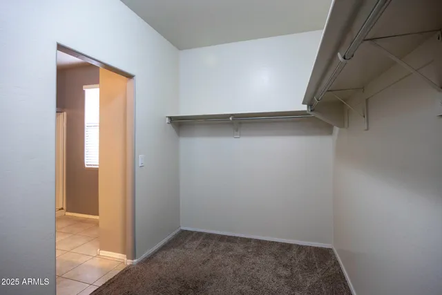 a view of a bathroom with a glass door shower