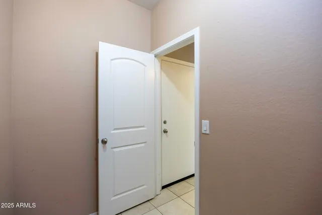 a view of room with washer and dryer