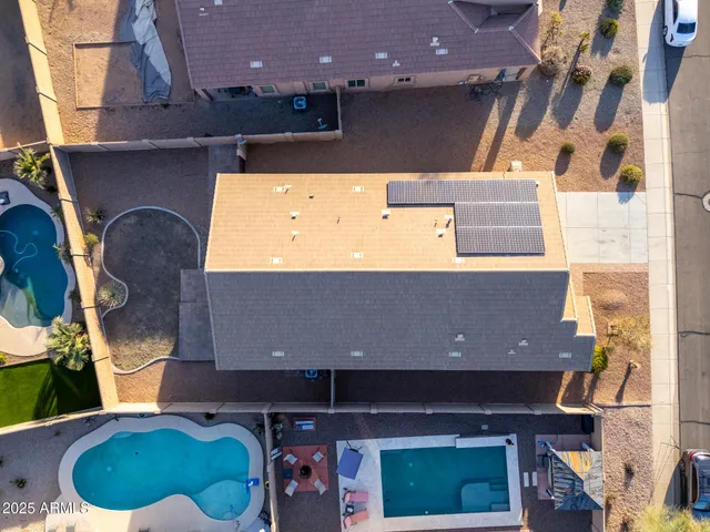 a house view with a backyard space