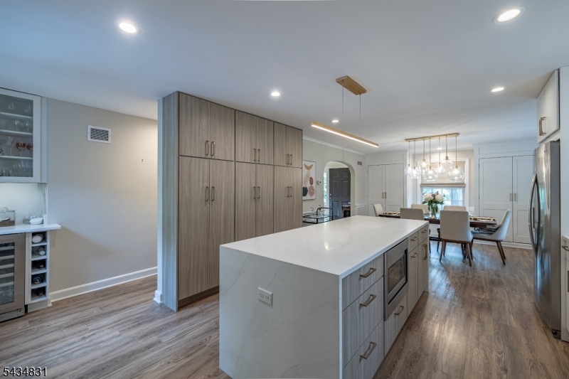 200 Wychwood Road Westfield, NJ 07090 - Photo 9 of 31 a large kitchen with a table and chairs