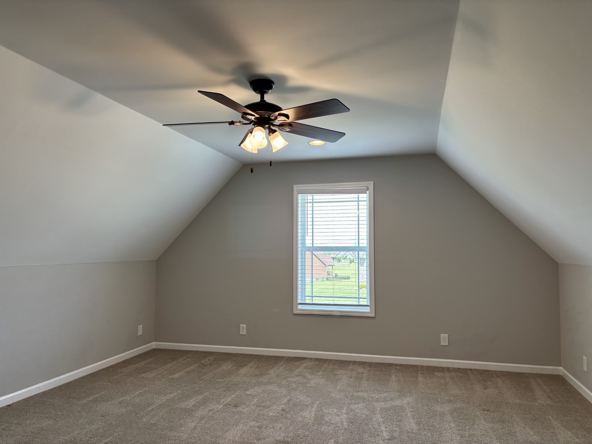 51 Regency Place Manchester, TN 37355 - Photo 21 of 27 an empty room with a window and a fan