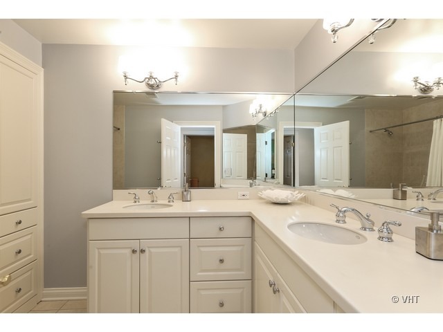 318 Forest Road Hinsdale, IL 60521 - Photo 15 of 23 a bathroom with a sink double vanity granite and a mirror